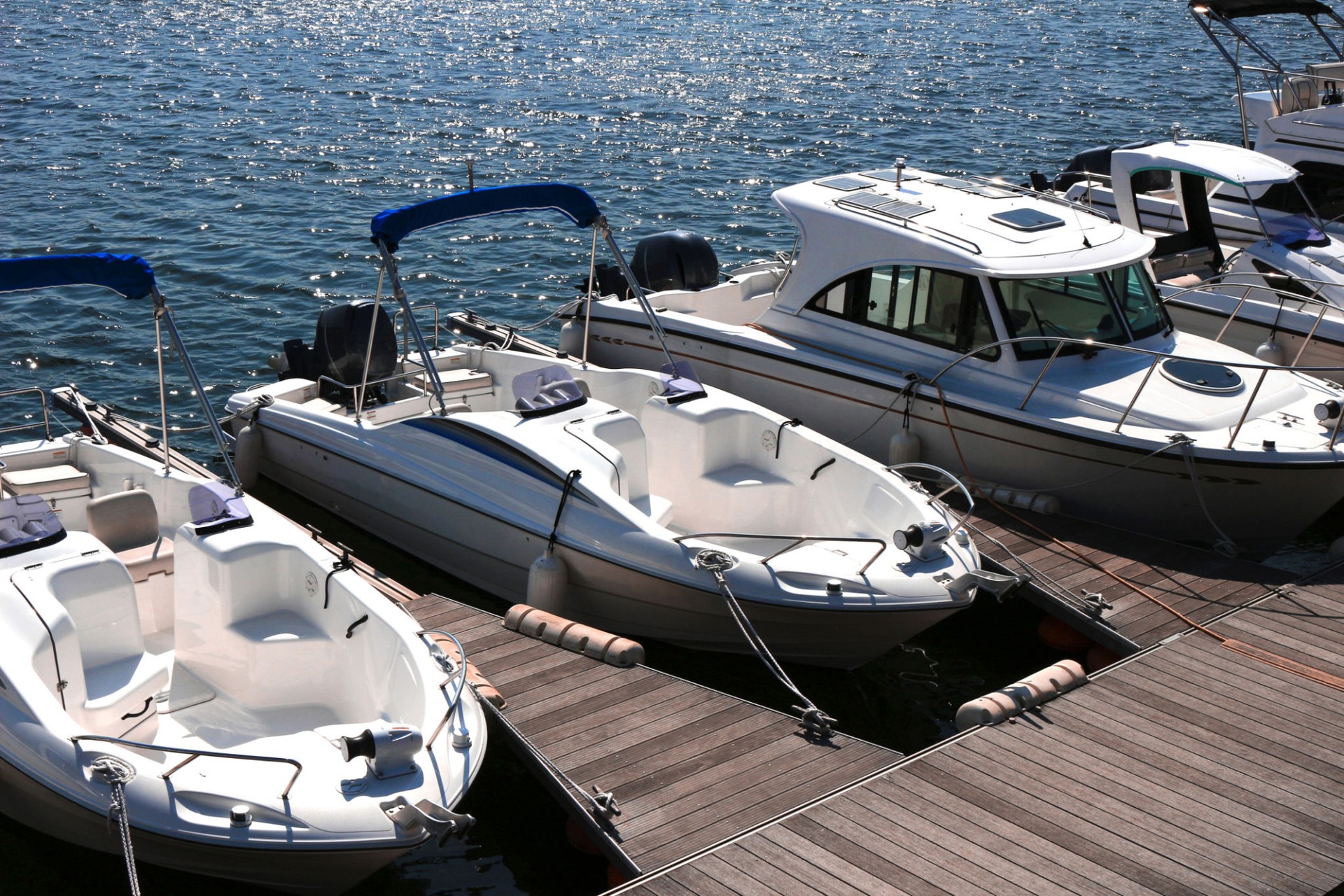 A pleasure boat lining the pier of the marina